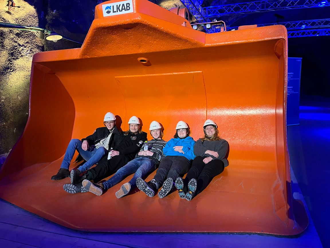 Me and other students sitting in a bucket of an LKAB loader truck