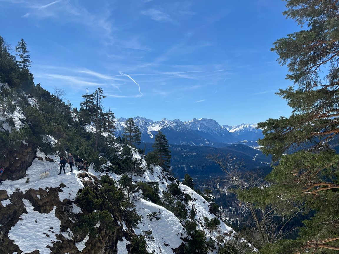 Snowy hiking trail on the side of Herzogstand
